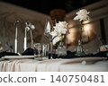 Top view of luxury dark and moody table decor for a fine dining event or reception 140750481