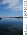 Kabushima Island, visible in the distance from Hachinohe Port. 140750495