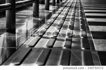 Tactile paving platform on the floor for blind people Tactile paving platform on the floor for blind people 140750572