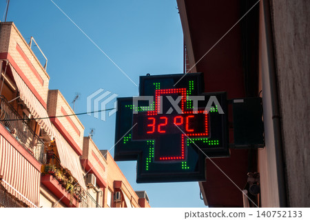 Pharmacy Temperature Display Showing 32 Degrees During Heat Wave Pharmacy Temperature Display Showing 32 Degrees During Heat Wave 140752133