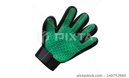 Green pet grooming glove isolated on transparent background. Silicone brush accessory for removing loose fur, massaging skin and everyday coat care for cats and dogs. Green pet grooming glove isolated on transparent background. Silicone brush accessory for removing loose fur, massaging skin and everyday coat care for cats and dogs. 140752669