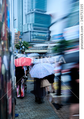 The pink umbrella stands out. The pink umbrella stands out. 140753105