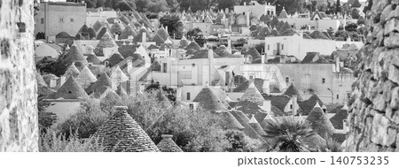 Scenic panoramic view of Alberobello and trulli buildings, Apulia, Italy 140753235