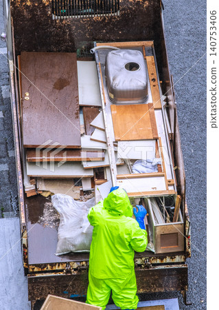 Apartment renovation in Yokohama, Japan. Waste materials are being loaded onto trucks one after another. (Yokohama city) Apartment renovation in Yokohama, Japan. Waste materials are being loaded onto trucks one after another. (Yokohama city) 140753406