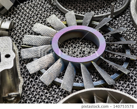 3D metal parts and components for machinery lying on a textured surface 3D metal parts and components for machinery lying on a textured surface 140753578