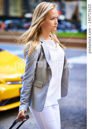 Business woman, luggage and walking in city with traffic on travel, suit and outdoor in street. Person, thinking and baggage for global journey with direction on sidewalk by cars in road in New York 140753620