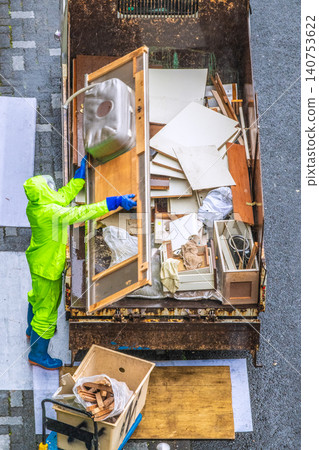 Apartment renovation in Yokohama, Japan. Waste materials are being loaded onto trucks one after another. (Yokohama city) Apartment renovation in Yokohama, Japan. Waste materials are being loaded onto trucks one after another. (Yokohama city) 140753622