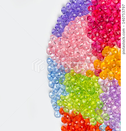 Colored beads for design on a white background 140753797