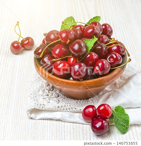Cherry, Cherry in a clay plate on the table Cherry, Cherry in a clay plate on the table 140753855