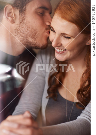 Happy couple, kiss and love with embrace for support, intimacy or affection together at indoor cafe. Man and woman with affection on cheek for date, relationship or romantic bonding at coffee shop Happy couple, kiss and love with embrace for support, intimacy or affection together at indoor cafe. Man and woman with affection on cheek for date, relationship or romantic bonding at coffee shop 140753925