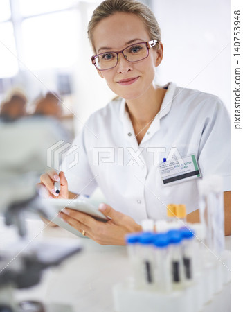 Medical, research and portrait of woman with tablet in laboratory with development in biotechnology. Doctor, typing or check results online of pharmaceutical report or review of innovation in science Medical, research and portrait of woman with tablet in laboratory with development in biotechnology. Doctor, typing or check results online of pharmaceutical report or review of innovation in science 140753948