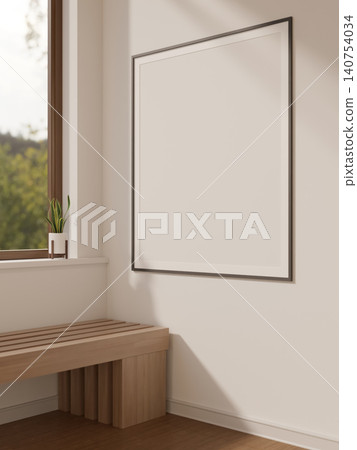 Thin black photo poster frame hanging on white wall over wooden bench by window under soft sunlight. Thin black photo poster frame hanging on white wall over wooden bench by window under soft sunlight. 140754034