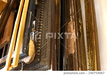 Ornate Wooden Frame With Intricate Details Shown Close up at a Local Art Gallery During an Exhibition Ornate Wooden Frame With Intricate Details Shown Close up at a Local Art Gallery During an Exhibition 140754067