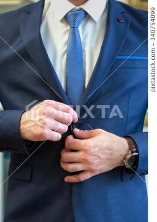 wedding men's hands button up. place for text wedding men's hands button up. place for text 140754099