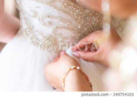 beautiful wedding dress close-up details of wedding lace beautiful wedding dress close-up details of wedding lace 140754103
