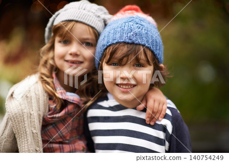 Kids, love and siblings portrait in a park for travel, adventure or bonding on autumn journey in nature. Family, face and children hug in a forest for explore, playing or fun games in Canada outdoor Kids, love and siblings portrait in a park for travel, adventure or bonding on autumn journey in nature. Family, face and children hug in a forest for explore, playing or fun games in Canada outdoor 140754249