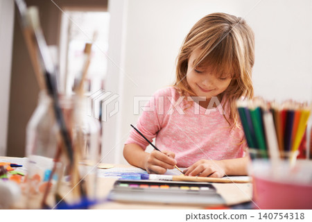 Happy child, writing and drawing with color for creativity, learning or education at home. Young girl with color pencil for sketching, activity or artwork in early childhood development at the house Happy child, writing and drawing with color for creativity, learning or education at home. Young girl with color pencil for sketching, activity or artwork in early childhood development at the house 140754318
