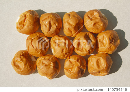 It is a well-baked morning roll. It is a well-baked morning roll. 140754346