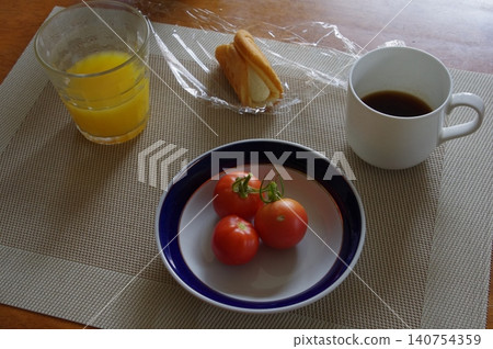 A table with cherry tomatoes and other items. A table with cherry tomatoes and other items. 140754359