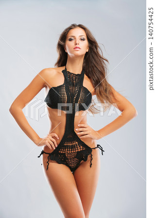 Fashion, swimsuit and portrait of woman on a white background for trendy, casual and summer style. Vacation, holiday and isolated person in swimwear with confidence, pride and wellness in studio Fashion, swimsuit and portrait of woman on a white background for trendy, casual and summer style. Vacation, holiday and isolated person in swimwear with confidence, pride and wellness in studio 140754425