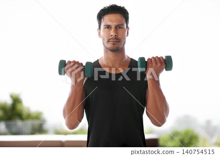 Portrait, dumbbell and serious man outdoor for training, exercise and sports to workout for power. Bodybuilder, face or strong person weightlifting for fitness, health or wellness in nature in Brazil Portrait, dumbbell and serious man outdoor for training, exercise and sports to workout for power. Bodybuilder, face or strong person weightlifting for fitness, health or wellness in nature in Brazil 140754515