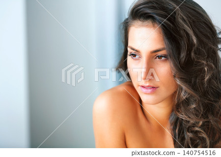 Woman, hair and thinking for beauty in bathroom with cosmetics, wellness and texture, balayage hairstyle and glow at home. Glamour, growth and volume with curls or waves, mockup space and treatment Woman, hair and thinking for beauty in bathroom with cosmetics, wellness and texture, balayage hairstyle and glow at home. Glamour, growth and volume with curls or waves, mockup space and treatment 140754516