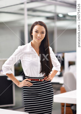 Portrait, young and business woman with confidence in workplace and professional person with ambition. Happy, face and entrepreneur for job satisfaction, pride and growth in career in startup company Portrait, young and business woman with confidence in workplace and professional person with ambition. Happy, face and entrepreneur for job satisfaction, pride and growth in career in startup company 140754526