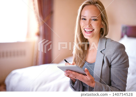 Business woman, tablet and portrait in hotel room with planning and working for conference with travel. Technology, bed and employee with smile, attorney brief and online email of a law professional Business woman, tablet and portrait in hotel room with planning and working for conference with travel. Technology, bed and employee with smile, attorney brief and online email of a law professional 140754528