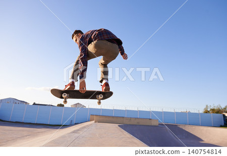 Sports, fitness and man with skateboard, jump or ramp action at a skate park for stunt training. Freedom, adrenaline and gen z male skater with energy, air or skill practice, exercise or performance Sports, fitness and man with skateboard, jump or ramp action at a skate park for stunt training. Freedom, adrenaline and gen z male skater with energy, air or skill practice, exercise or performance 140754814