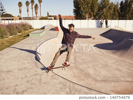 Fitness, sports and man with skateboard, jump or ramp action at a skate park for stunt training. Freedom, adrenaline and gen z male skater with energy, air or skill practice, exercise or performance Fitness, sports and man with skateboard, jump or ramp action at a skate park for stunt training. Freedom, adrenaline and gen z male skater with energy, air or skill practice, exercise or performance 140754879