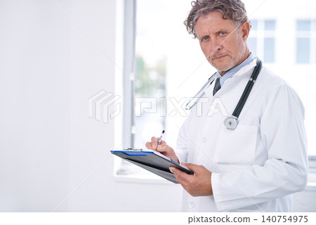 Medical, portrait and mature doctor with a checklist for healthcare, insurance or results of test. Clinic, exam and surgeon with paperwork folder for hospital and question information for document Medical, portrait and mature doctor with a checklist for healthcare, insurance or results of test. Clinic, exam and surgeon with paperwork folder for hospital and question information for document 140754975