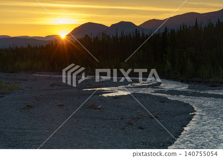 A breathtaking view of the mountains and rivers of Kluane National Park bathed in the morning light, near Haines Junction in Yukon Territory, Canada. A breathtaking view of the mountains and rivers of Kluane National Park bathed in the morning light, near Haines Junction in Yukon Territory, Canada. 140755054