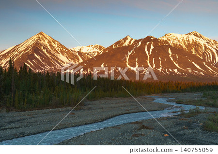 A breathtaking view of the mountains and rivers of Kluane National Park bathed in the morning light, near Haines Junction in Yukon Territory, Canada. 140755059