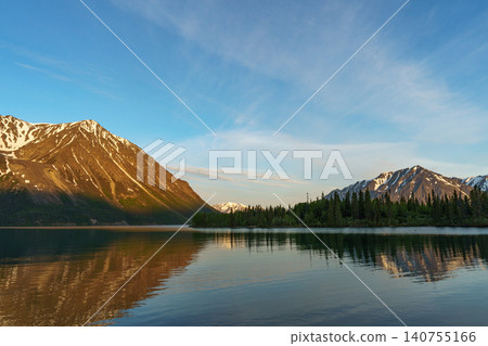 Kluane National Park, Yukon Territory, Canada: A breathtaking view of the mountains reflected in Lake Kathleen in the early morning. (Tourist attraction) 140755166