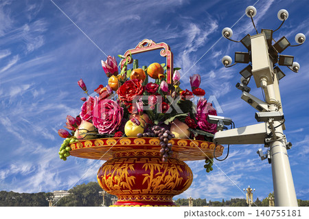 Street lamp and huge flower basket (against the background of a beautiful sky with clouds) in Tiananmen square, Beijing, China Street lamp and huge flower basket (against the background of a beautiful sky with clouds) in Tiananmen square, Beijing, China 140755181