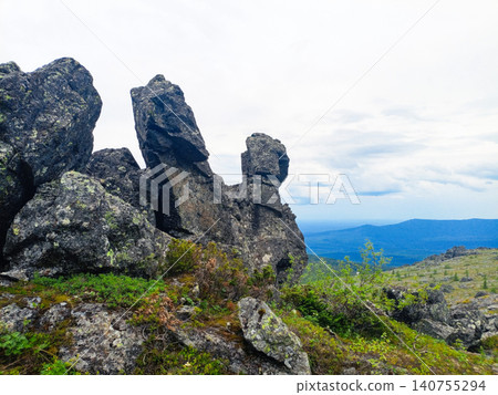 Rocky landscape on the slopes of the Ural Mountains. Rocky landscape on the slopes of the Ural Mountains. 140755294