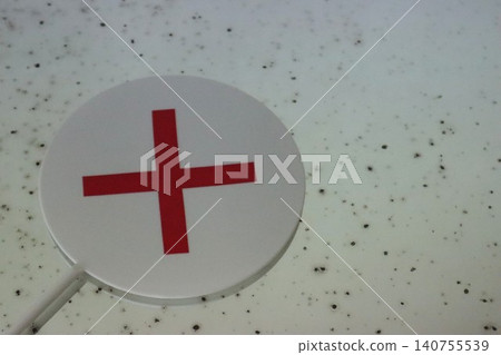 Dirt and an "X" mark on the bathroom mirror Dirt and an "X" mark on the bathroom mirror 140755539