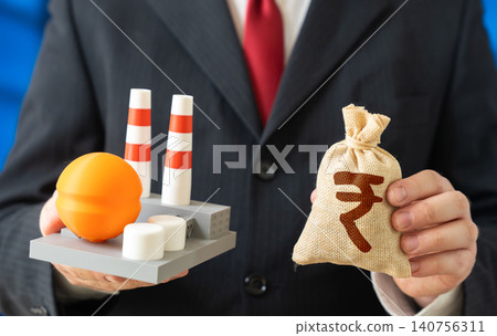 Chemical plant and a indian rupee money bag. Investments in industrial infrastructure and profitable facilities. Energy complex revenues and budget forming enterprises. Chemical plant and a indian rupee money bag. Investments in industrial infrastructure and profitable facilities. Energy complex revenues and budget forming enterprises. 140756311