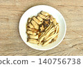 stir fried mixed mushroom topping black mushroom in garlic and pepper gravy soy sauce on plate 140756738