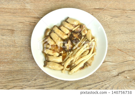 stir fried mixed mushroom topping black mushroom in garlic and pepper gravy soy sauce on plate 140756738
