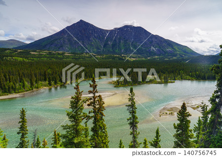 Canada's Yukon Territory: A magnificent natural landscape woven from the taiga forest and the Taquini River. Canada's Yukon Territory: A magnificent natural landscape woven from the taiga forest and the Taquini River. 140756745
