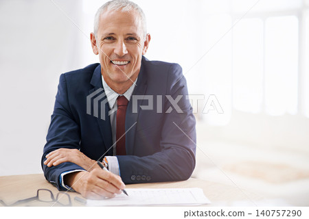 Office, documents and portrait of business man with confidence for career, job and working at desk. Professional, startup agency and senior person writing notes for company pride, smile and planning Office, documents and portrait of business man with confidence for career, job and working at desk. Professional, startup agency and senior person writing notes for company pride, smile and planning 140757290