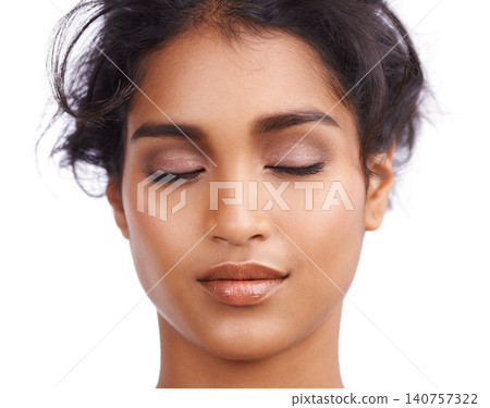 Beauty, eyes and Indian woman in studio for makeup glamour, cosmetics or wellness on white background. Face, calm or female model with glowing skin, results or cosmetology, shine or satisfaction Beauty, eyes and Indian woman in studio for makeup glamour, cosmetics or wellness on white background. Face, calm or female model with glowing skin, results or cosmetology, shine or satisfaction 140757322