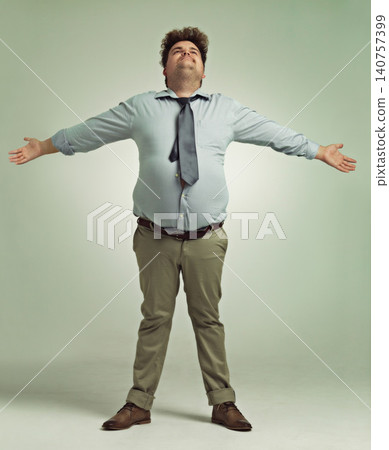 Studio, happiness and man with arms for freedom in background, positive and joy of living life. Plus size, adult and male person with confidence, pride and professional with suit and guy with smile Studio, happiness and man with arms for freedom in background, positive and joy of living life. Plus size, adult and male person with confidence, pride and professional with suit and guy with smile 140757399