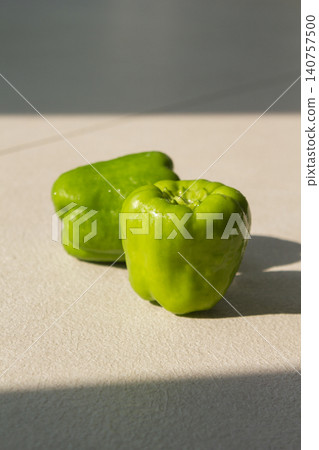 It is a close-up of a green bell pepper. It is a close-up of a green bell pepper. 140757500