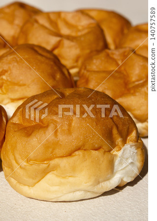 It is a well-baked morning roll. It is a well-baked morning roll. 140757589