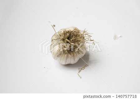 Garlic on a white background. 140757718