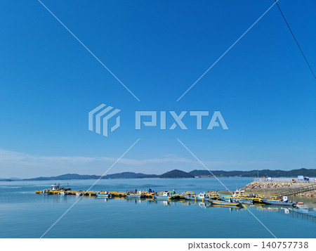 This is the sea where fishing boats are anchored. This is the sea where fishing boats are anchored. 140757738