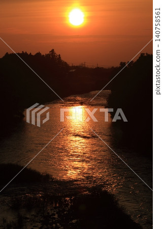Sunset reflected on the river Sunset reflected on the river 140758561