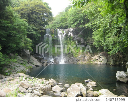 The white thread-like Cheonjeyeon Waterfall of Jeju Island The white thread-like Cheonjeyeon Waterfall of Jeju Island 140758999